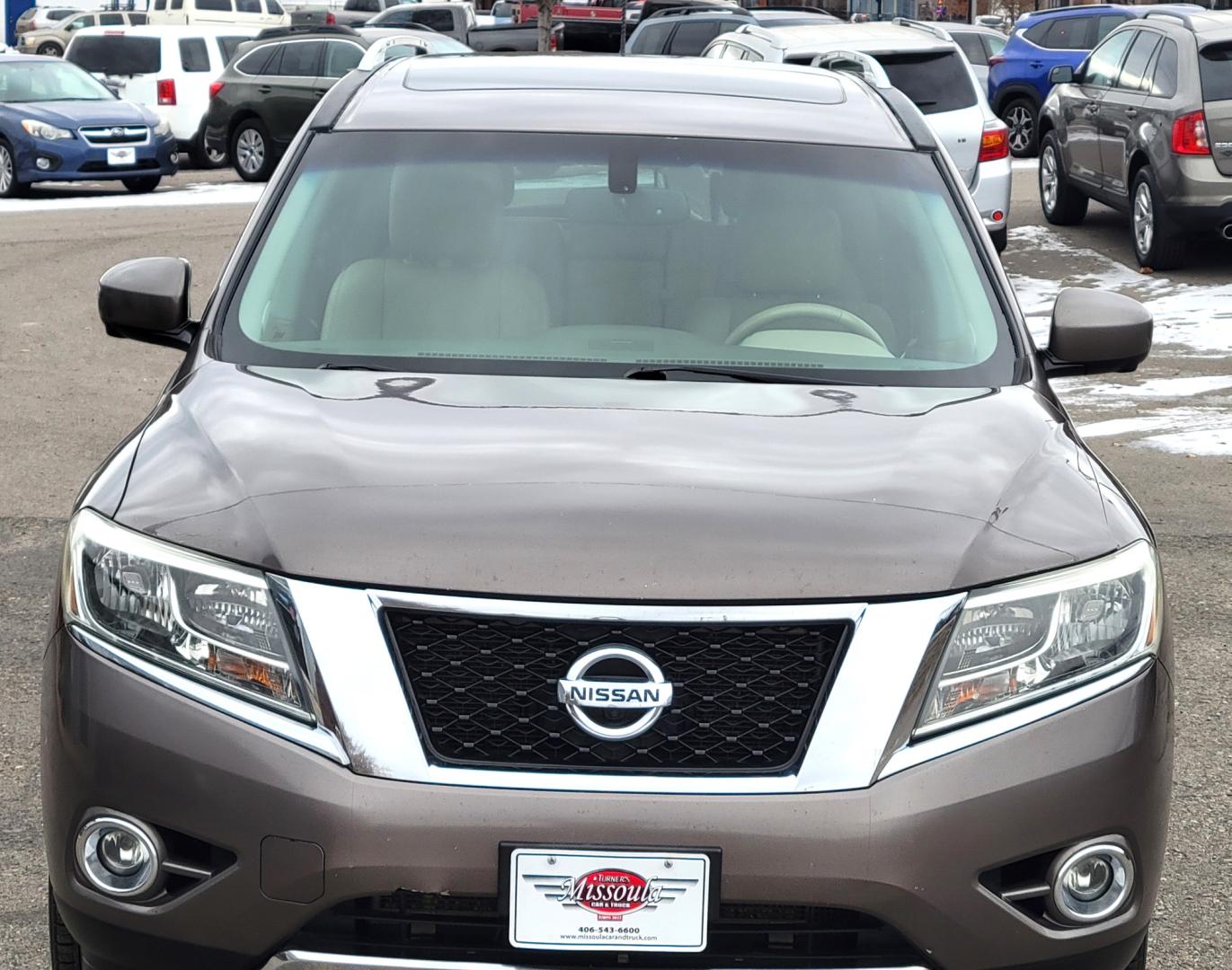 2013 Brown /Tan Nissan Pathfinder Platinum (5N1AR2MM1DC) with an 3.5L V6 engine, Automatic / CVT transmission, located at 450 N Russell, Missoula, MT, 59801, (406) 543-6600, 46.874496, -114.017433 - 4 Wheel Drive SUV. Power Sunroof. 3rd Row Seating. Heated Leather Front and Middle Seats. Power Front Seats. DVD Screens in Headrests. Navigation. Bluetooth. Backup Camera. AM FM CD DVD XM. Heated Steering Wheel. Towing. - Photo#3